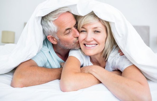 happy-couple-in-bed-testosterone-libido.jpg
